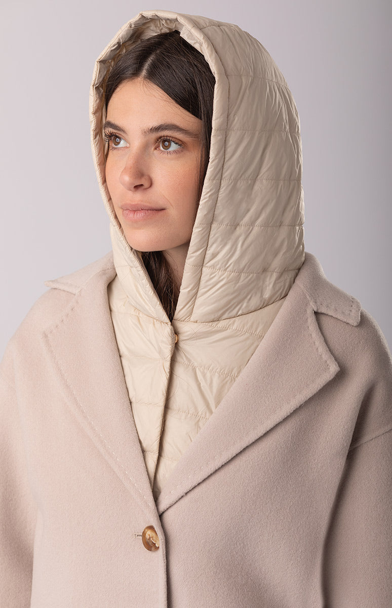 MetÃ  piumino sale metÃ  cappotto