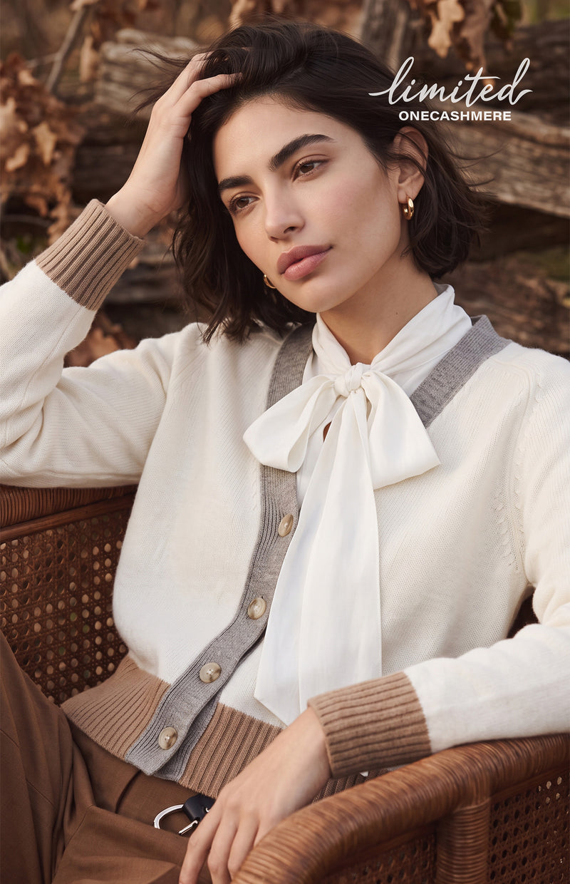 Cardigan asimmetrico con contrasti